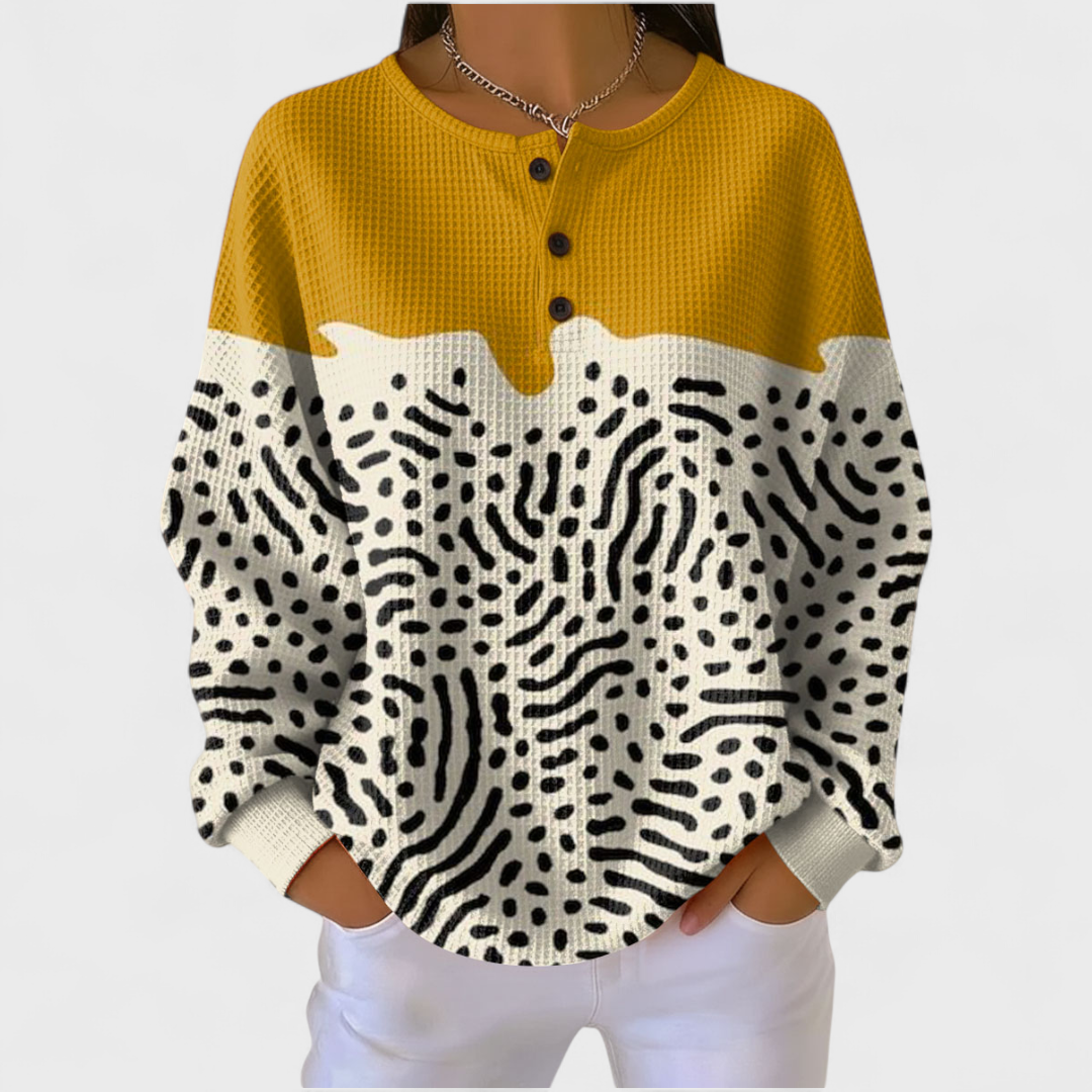 Liv - Suéter bicolor amarillo y blanco con diseño de estampado animal