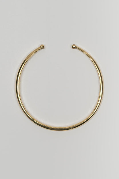 Collar Névora latón