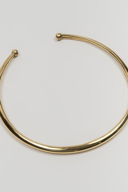 Collar Névora latón
