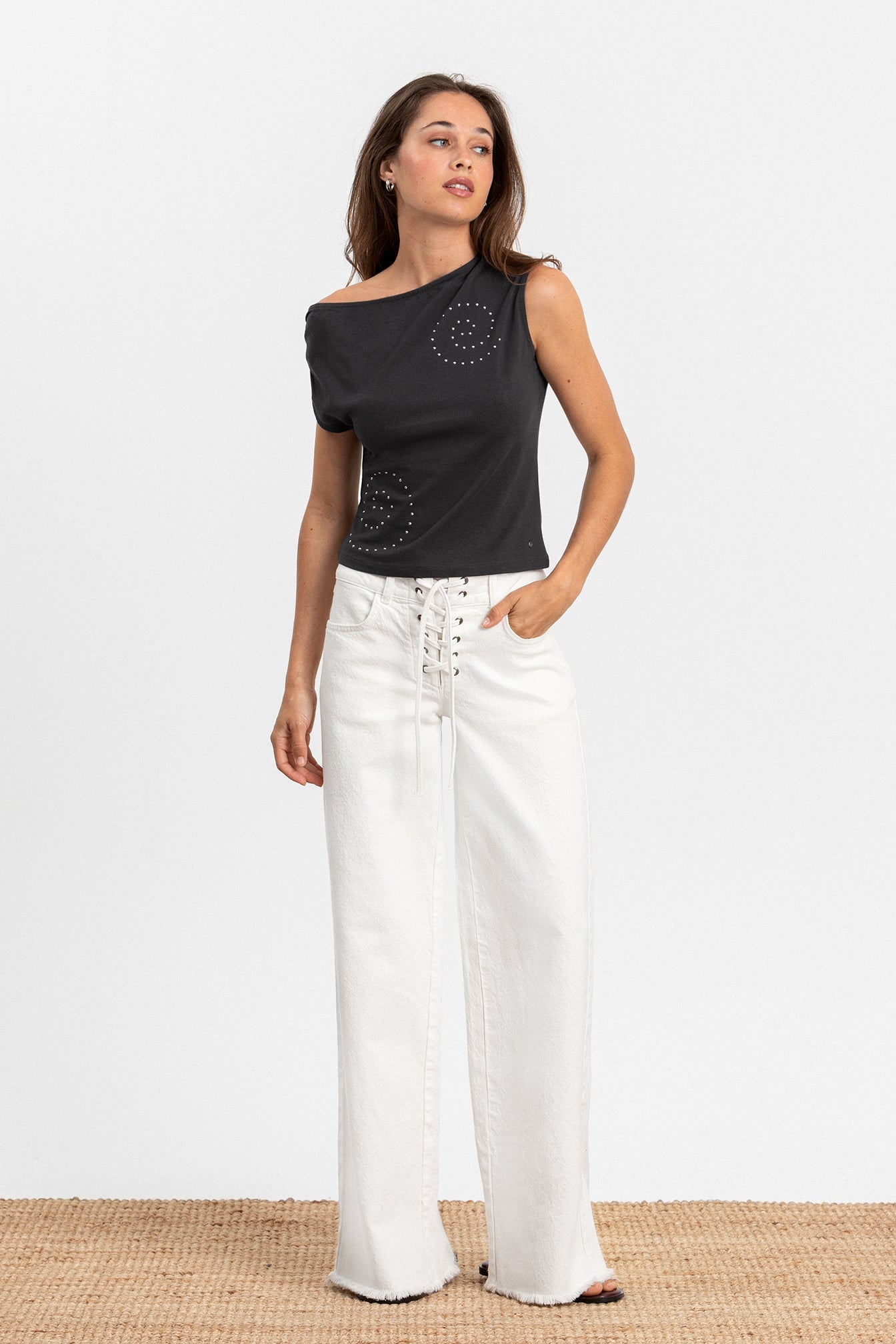TOP ASIMETRICO TACHAS ESPIRAL