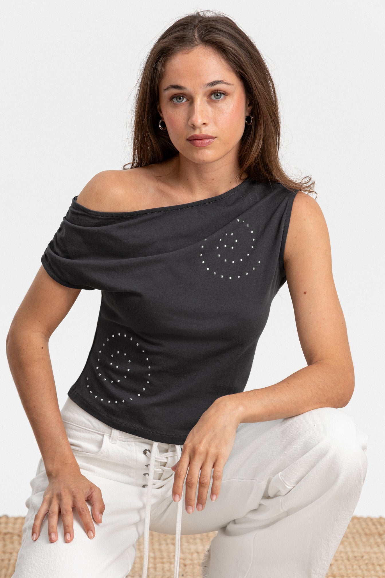 TOP ASIMETRICO TACHAS ESPIRAL