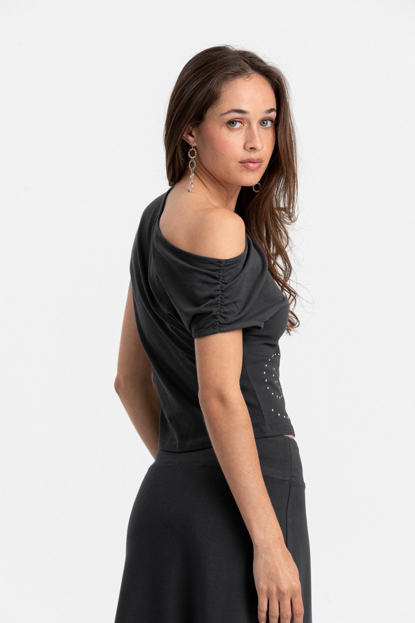 TOP ASIMETRICO TACHAS ESPIRAL