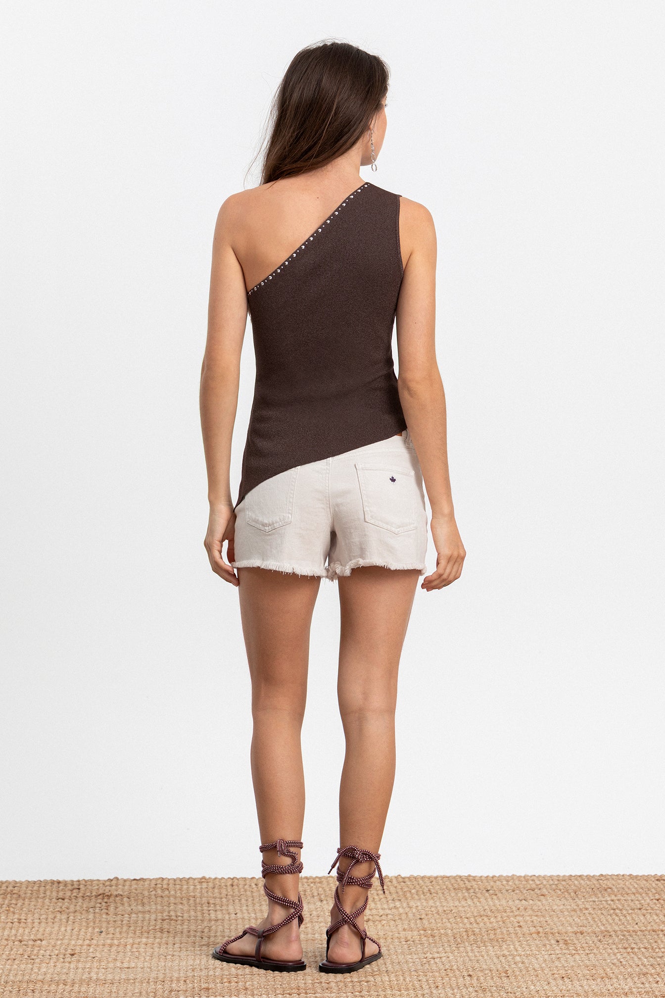 TOP ASIMETRICO TACHUELAS