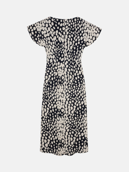Vestido midi drapeado lunares blanco y negro