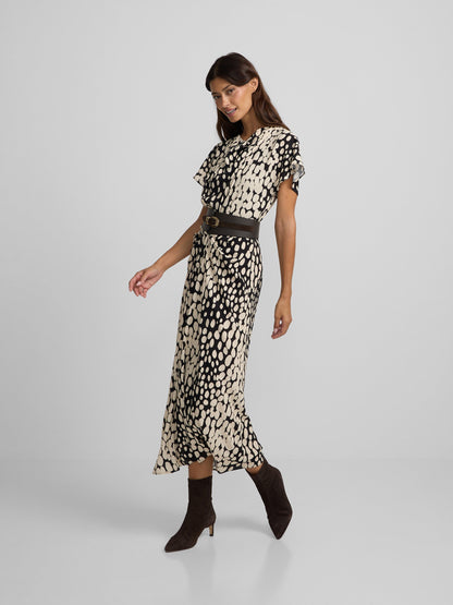 Vestido midi drapeado lunares blanco y negro