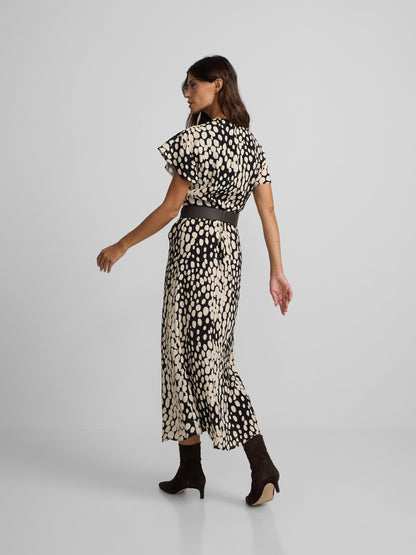 Vestido midi drapeado lunares blanco y negro
