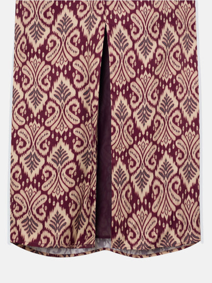 Vestido largo drapeado estampado ikat granate