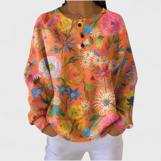 Faustine - Suéter Naranja con Diseño Floral Vibrante