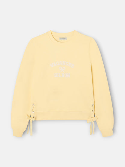 Sudadera woman detalle cuerdas amarilla