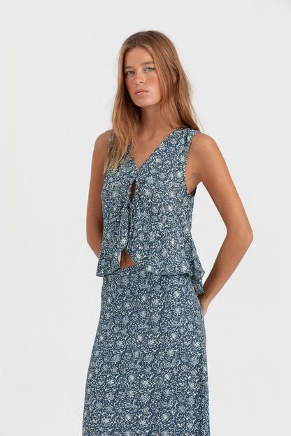 FALDA MIDI BAJO VOLANTE