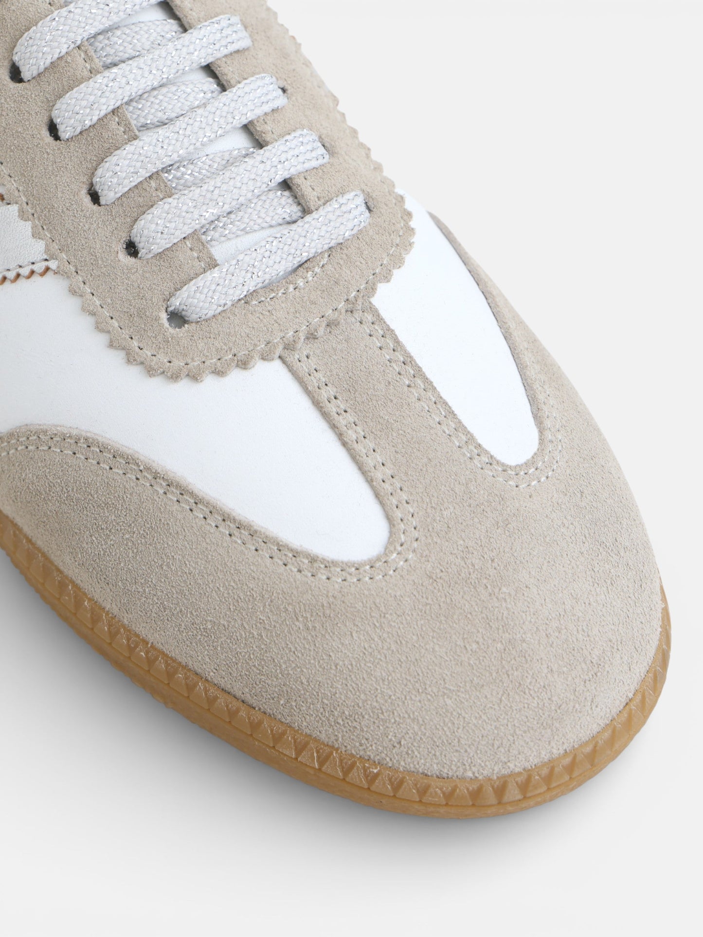 Zapatilla piel animal print blanca