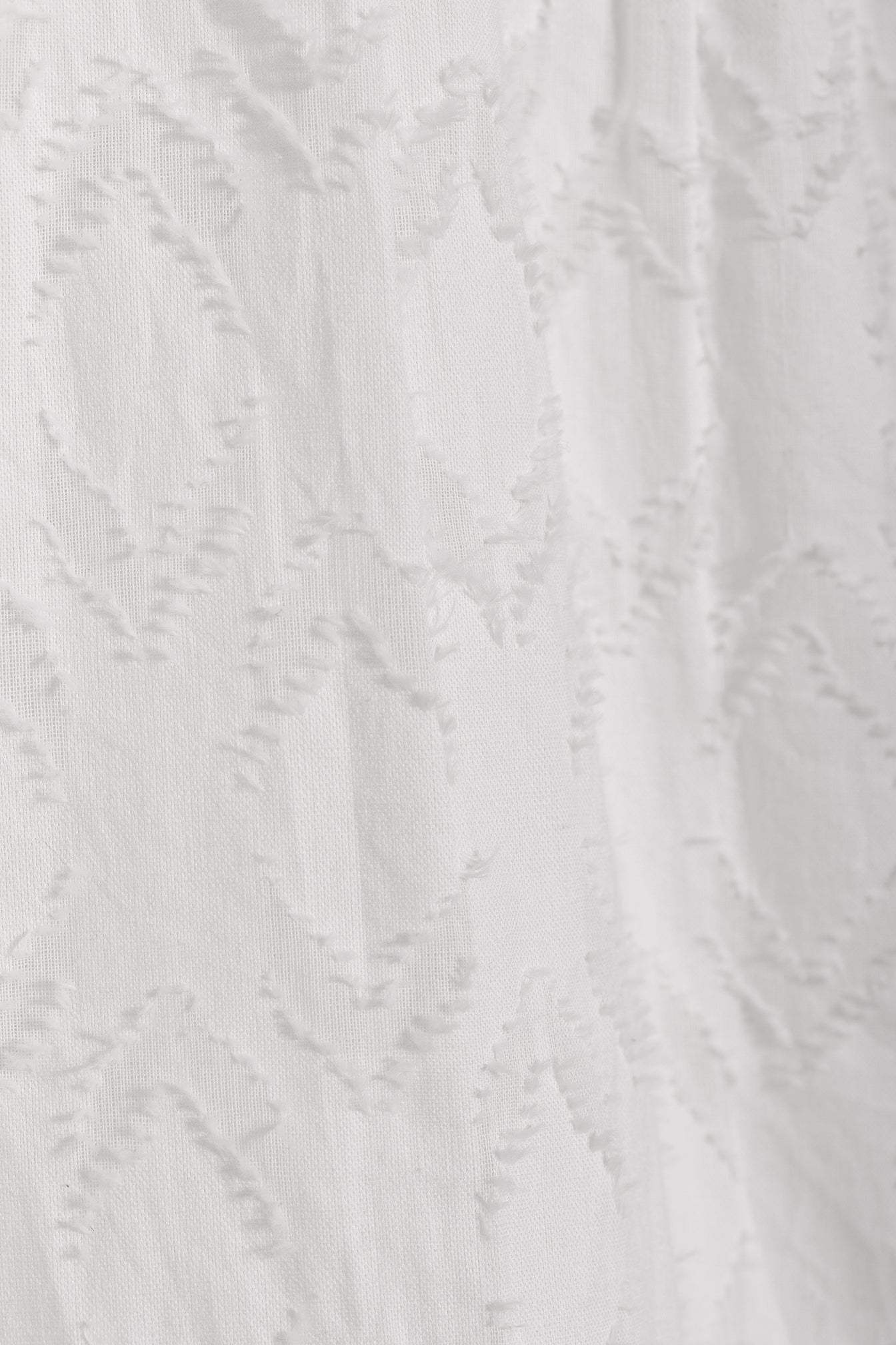 BLUSA TEXTURA VOLANTES