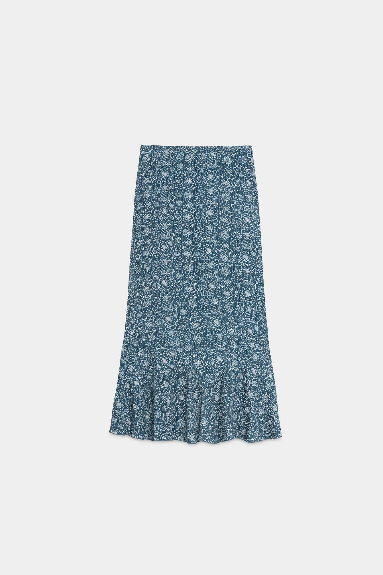 FALDA MIDI BAJO VOLANTE