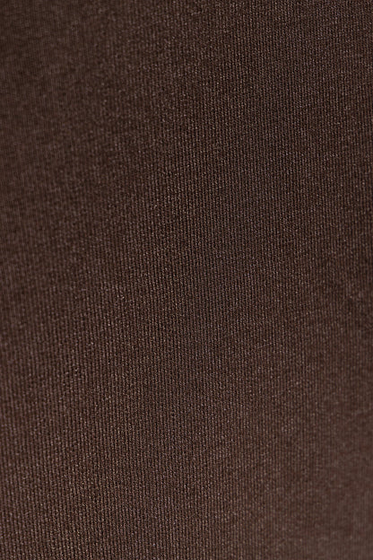TOP ASIMETRICO TACHUELAS